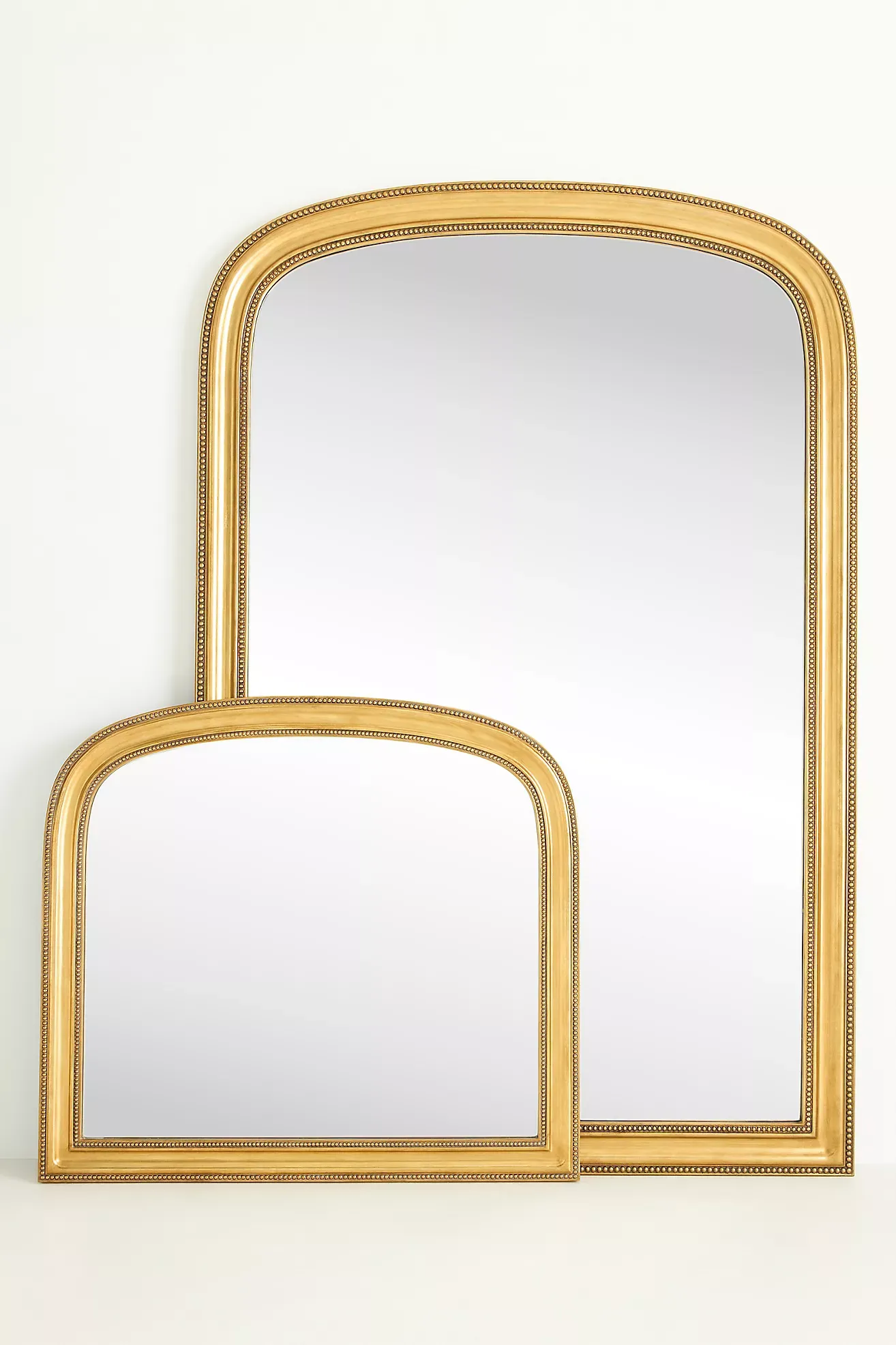 The Gleaming Louie Beaded Arched Floor Mirror