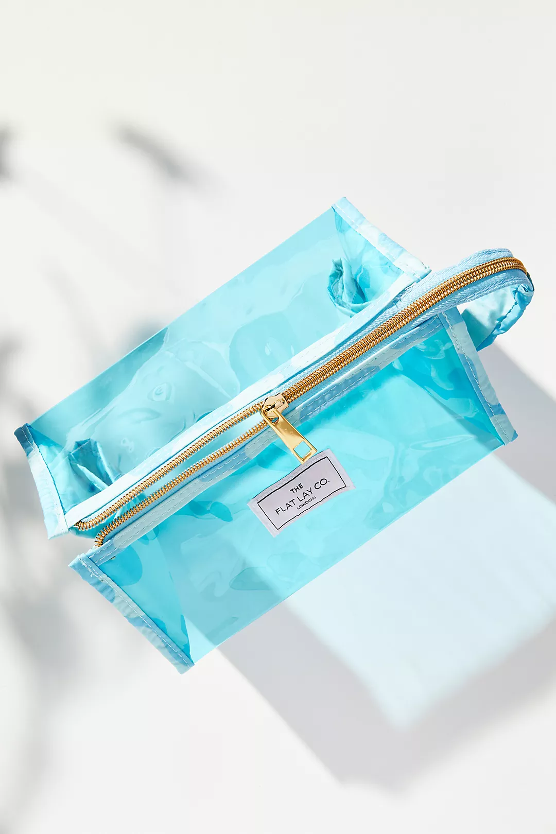 The Flat Lay Co. Open Flat Makeup Jelly Box Bag