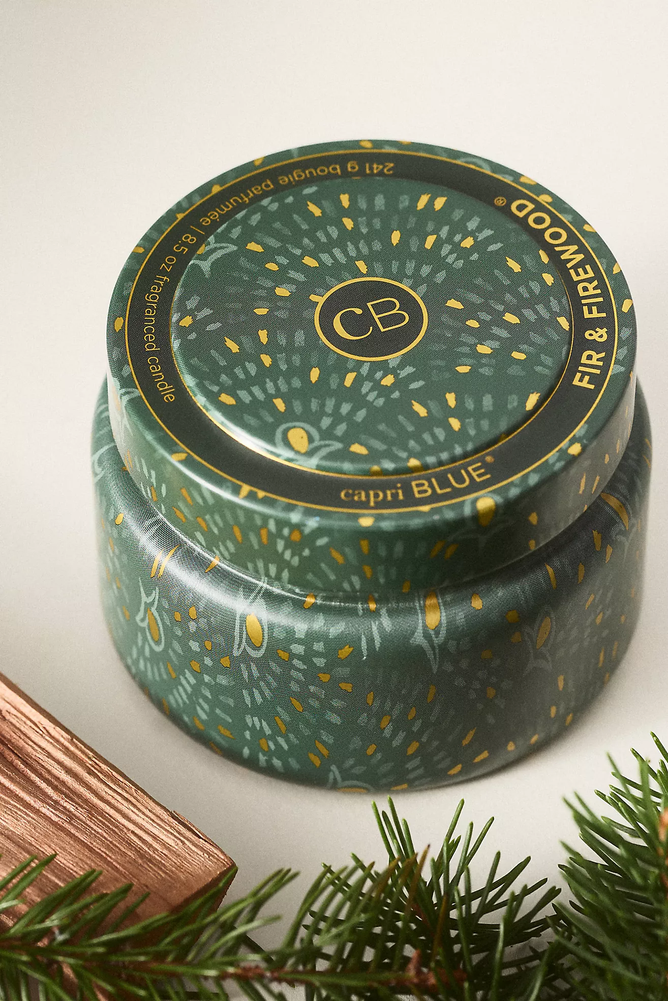 Capri Blue Woody Fir & Firewood Tin Candle
