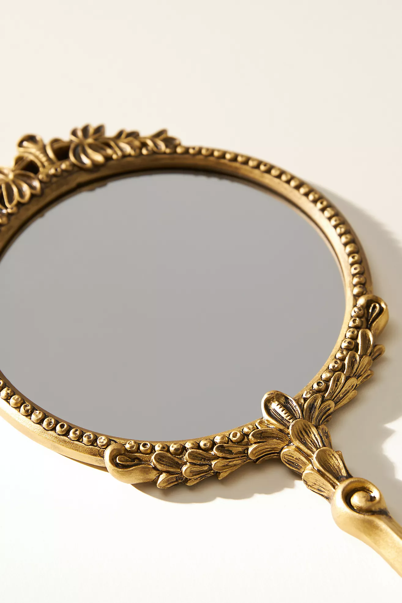 The Gleaming Primrose Hand Mirror
