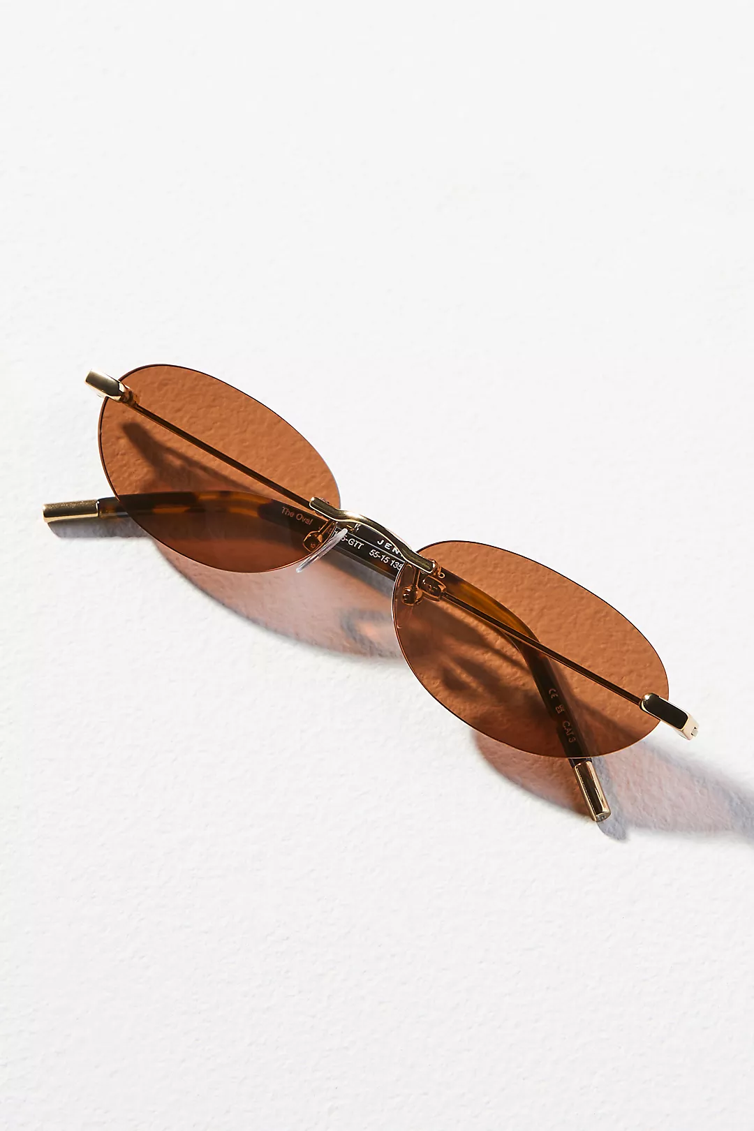 Jenny Bird Frameless Oval Sunglasses