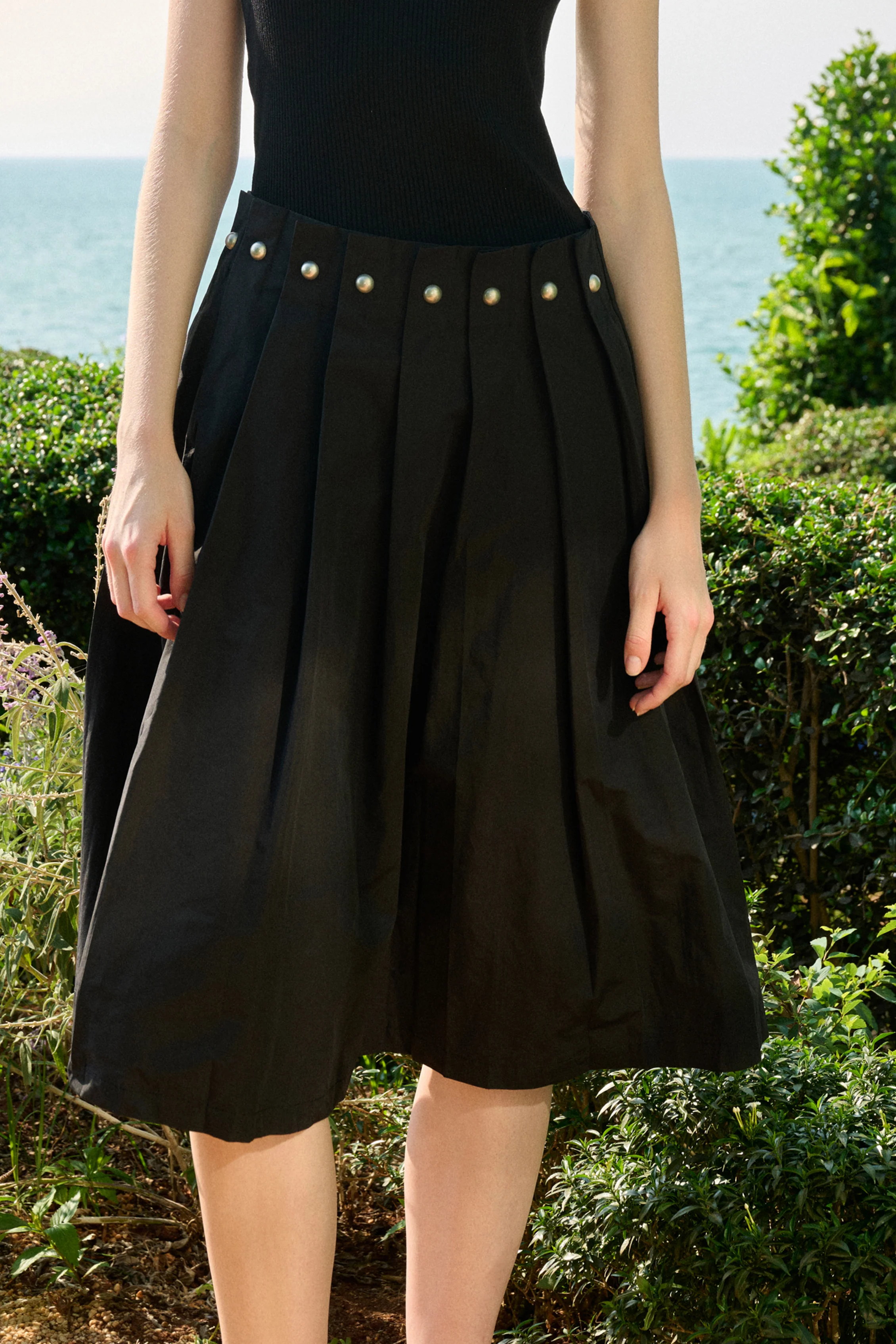 Studded pleated midi skirt